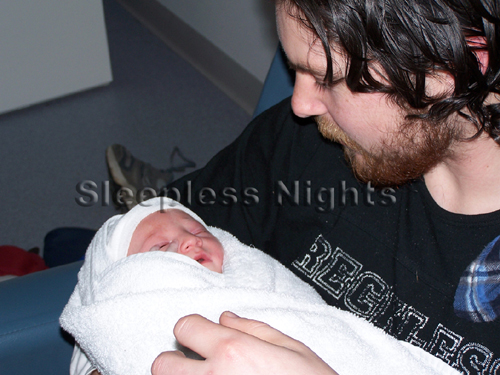 daddys-first-cuddle2-copy.jpg