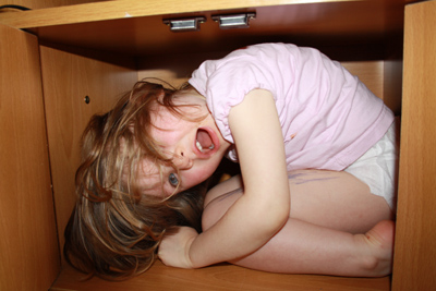 Amy in the TV cabinet